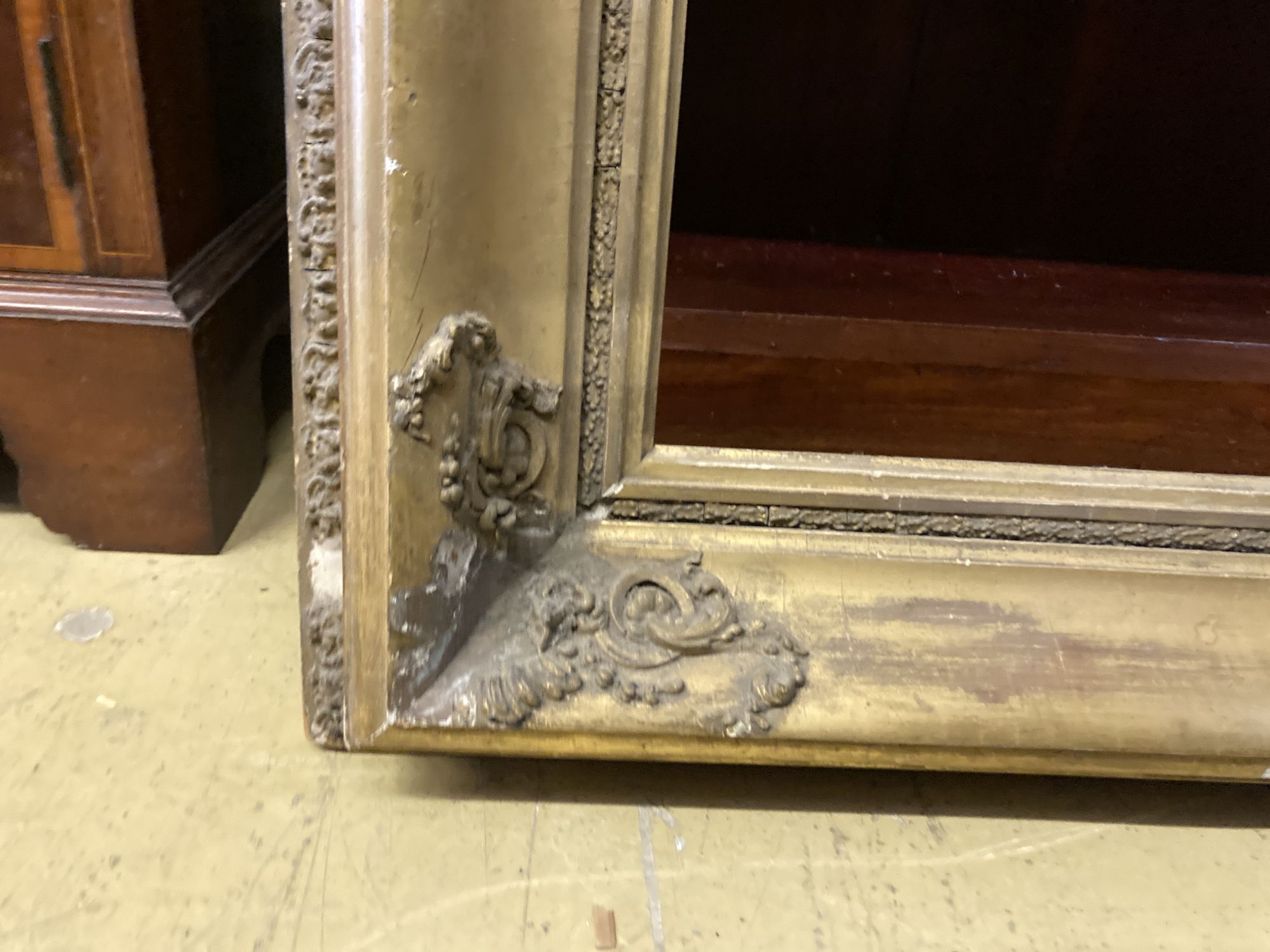 A Victorian gilt gesso rectangular picture frame, width 72cm, height 93cm